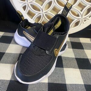 Nike Kids Black Sneakers with Gold Accents